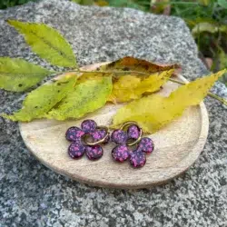 présentation pampilles forme marguerite en résine couleur fuchsia